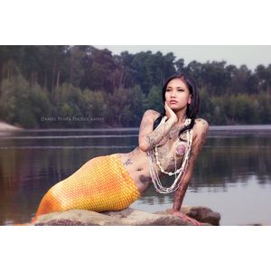 Mermaid beauty at a lake